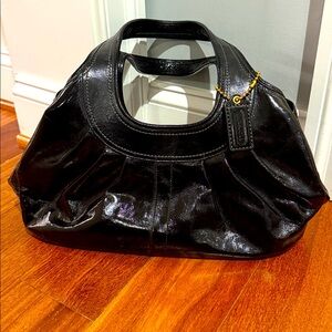 Vintage Coach purse w/dust bag. Black patent leather w/light blue lining.
